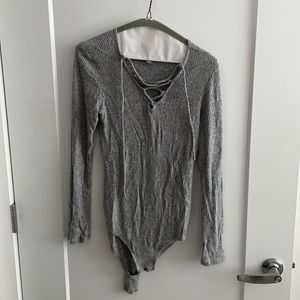 Grey crisscross body suit